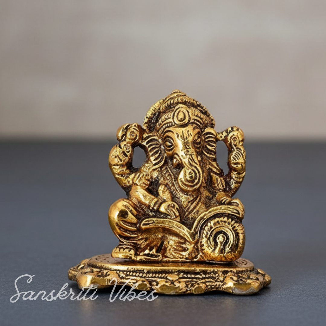 Metal Ganesh Ji Idol with Reading Book Gold Plated for Home and Office Decoration - Retail Maharaj