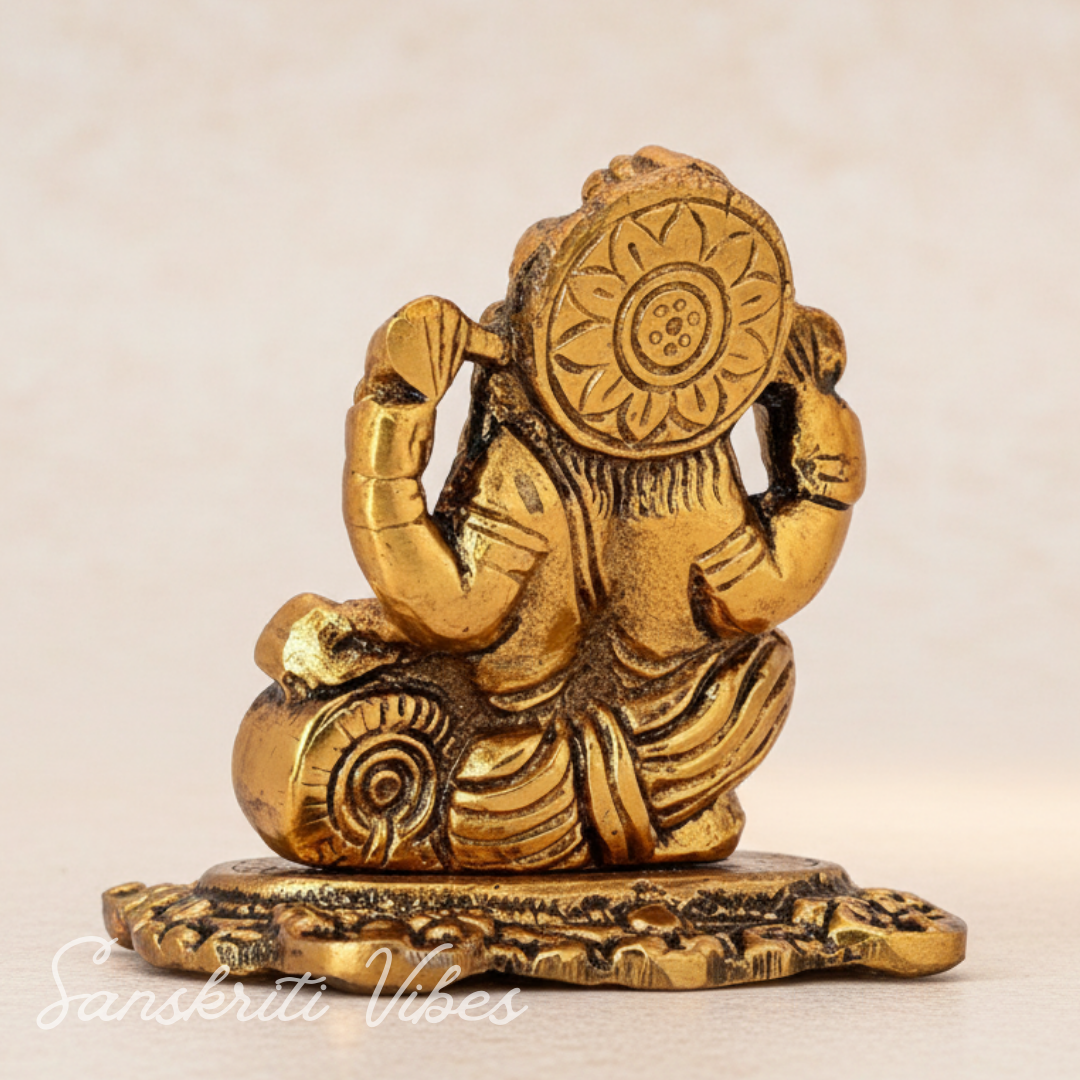 Metal Ganesh Ji Idol with Reading Book Gold Plated for Home and Office Decoration - Retail Maharaj