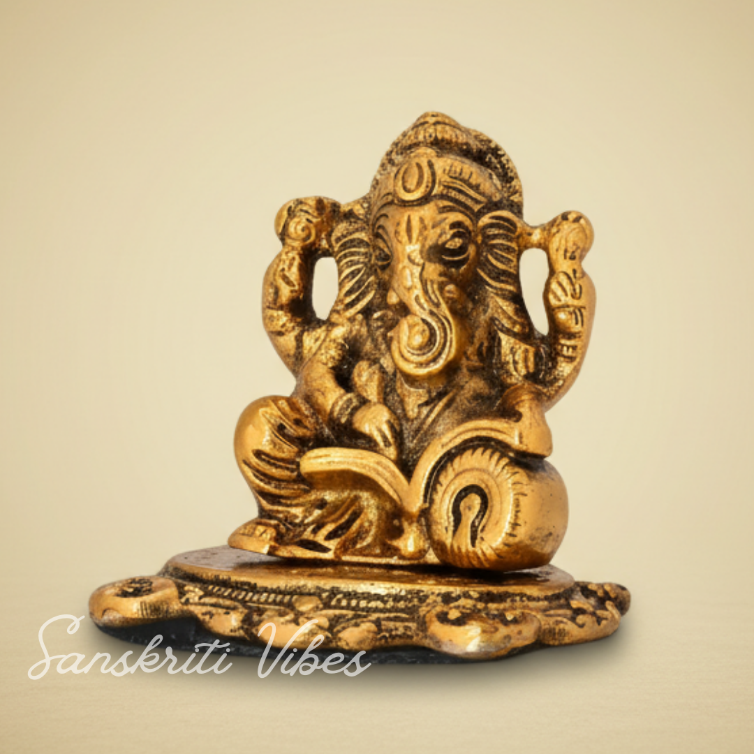 Metal Ganesh Ji Idol with Reading Book Gold Plated for Home and Office Decoration - Retail Maharaj