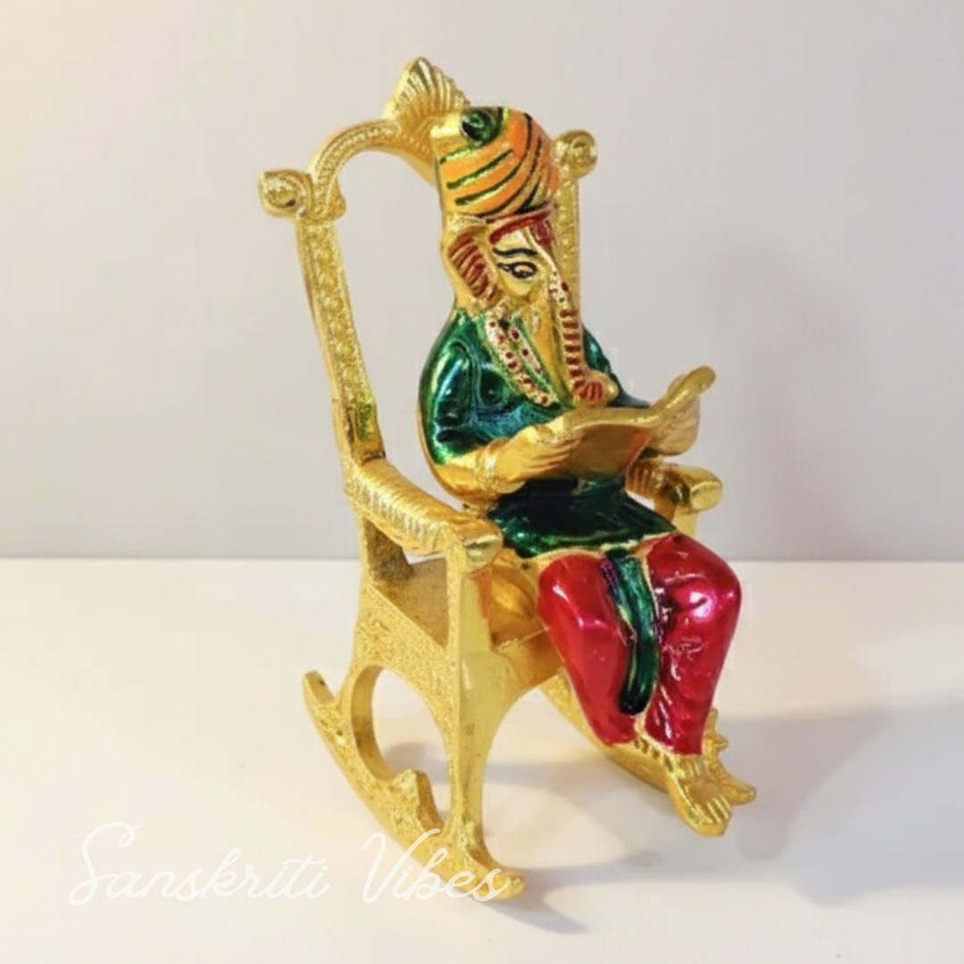 Modern Chair Ganesha Metal Statue Reading Ramayan with Meenakari Work Aluminium Ganesh Showpiece for Home Decor and Auspicious Gifting - Retail Maharaj