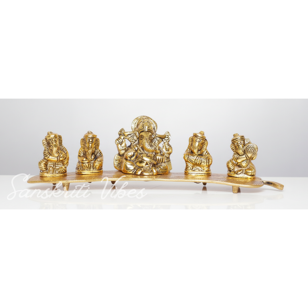 White Metal Gold Plated Ganesha On Leaf With Musical Instrument Metal Statue For Pooja Home Decor And Gift Purpose - Retail Maharaj