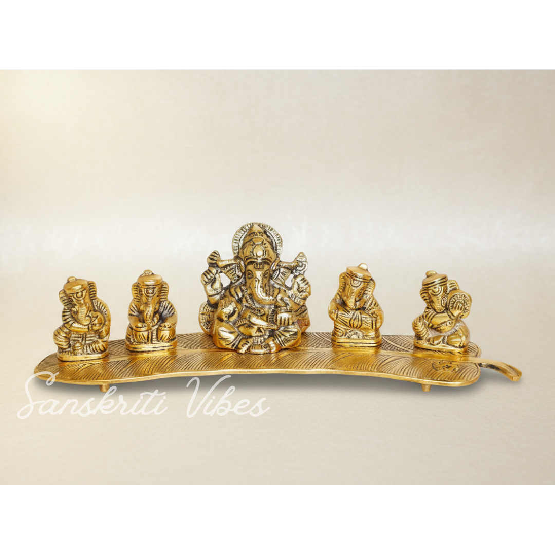 White Metal Gold Plated Ganesha On Leaf With Musical Instrument Metal Statue For Pooja Home Decor And Gift Purpose - Retail Maharaj