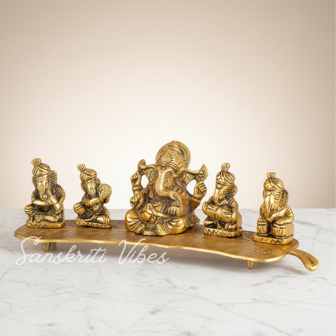 White Metal Gold Plated Ganesha On Leaf With Musical Instrument Metal Statue For Pooja Home Decor And Gift Purpose - Retail Maharaj