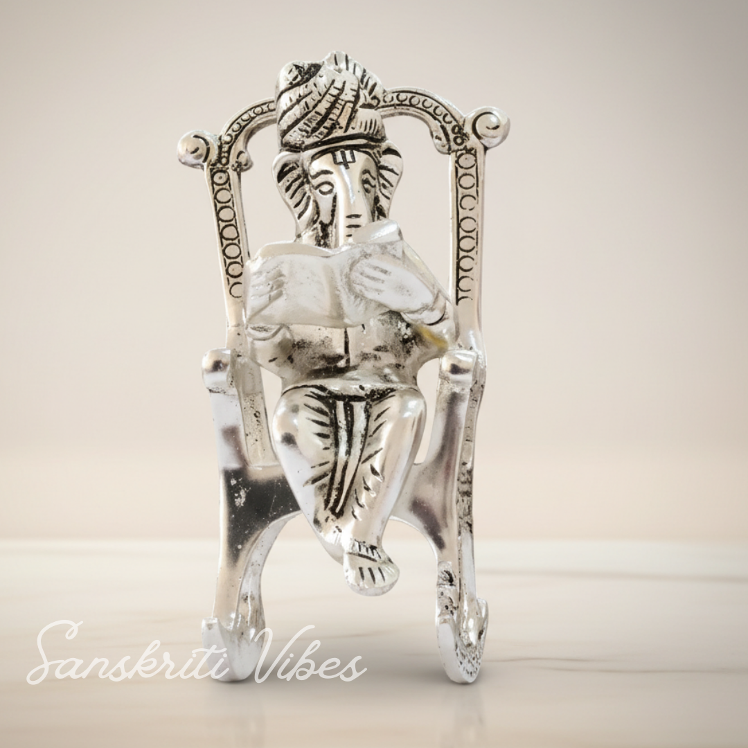 Metal Chair Ganesh Ganpati Idol with Reading Ramayan Metallic Gold Finish Traditional Indian Decorative Showpiece - Retail Maharaj
