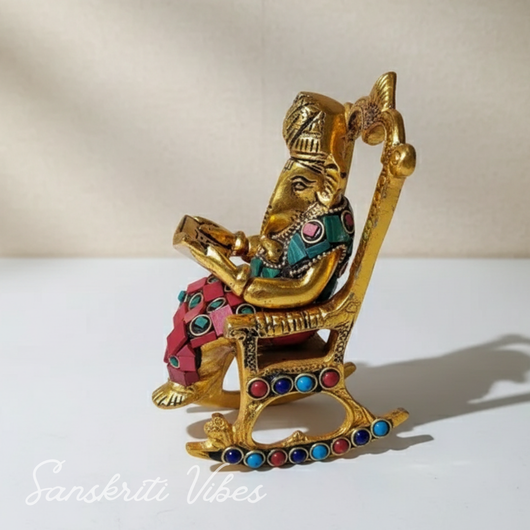 Modern Chair Ganesha Metal Statue Reading Ramayan with Stone Work Showpiece for Home Glossy Finish Ganpati Idol - Retail Maharaj