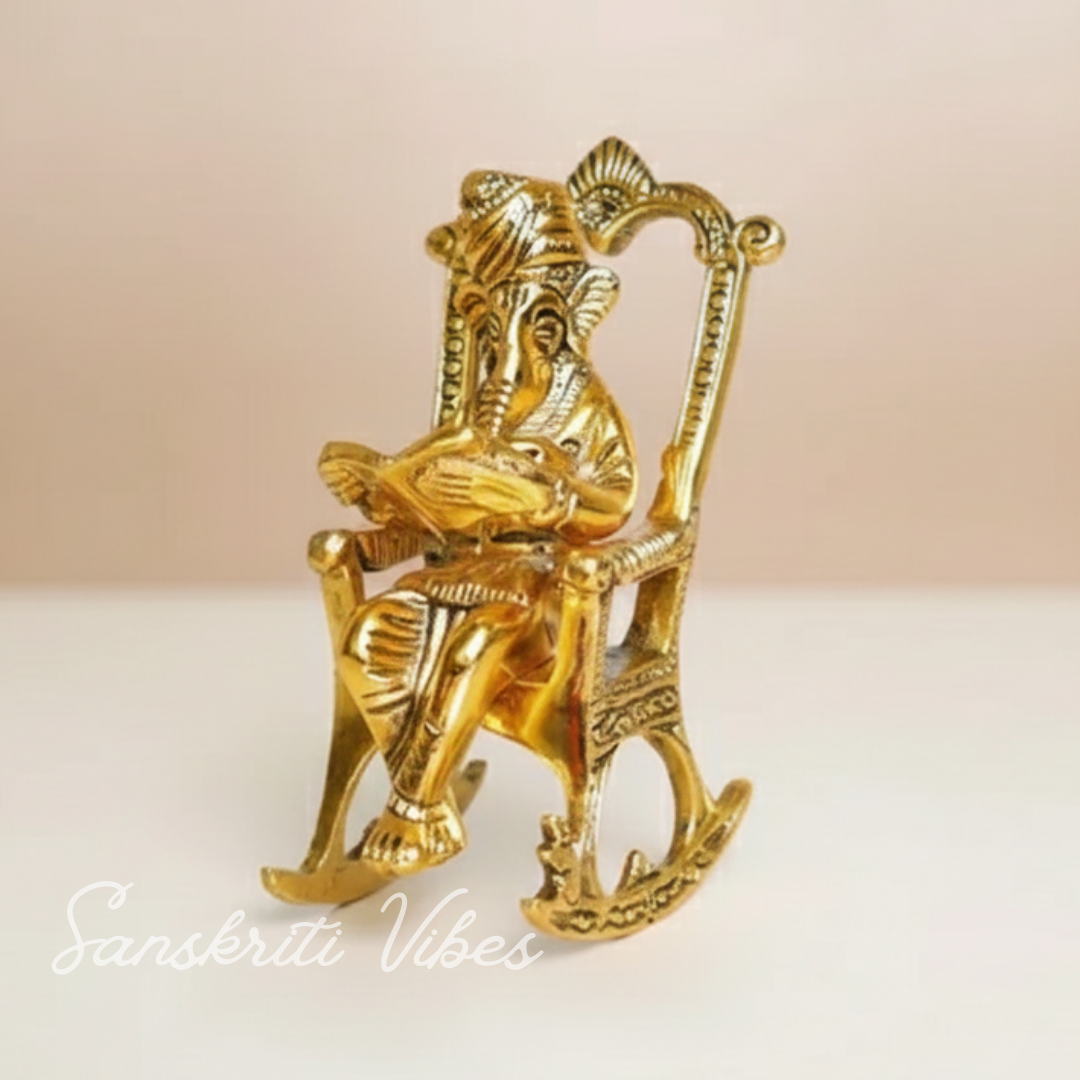 Metal Ganesha Sitting on Moving Chair Reading Ramayan – Handcrafted Ganpati Decorative Statue for Home & Office (Glossy Finish, Made in India)
