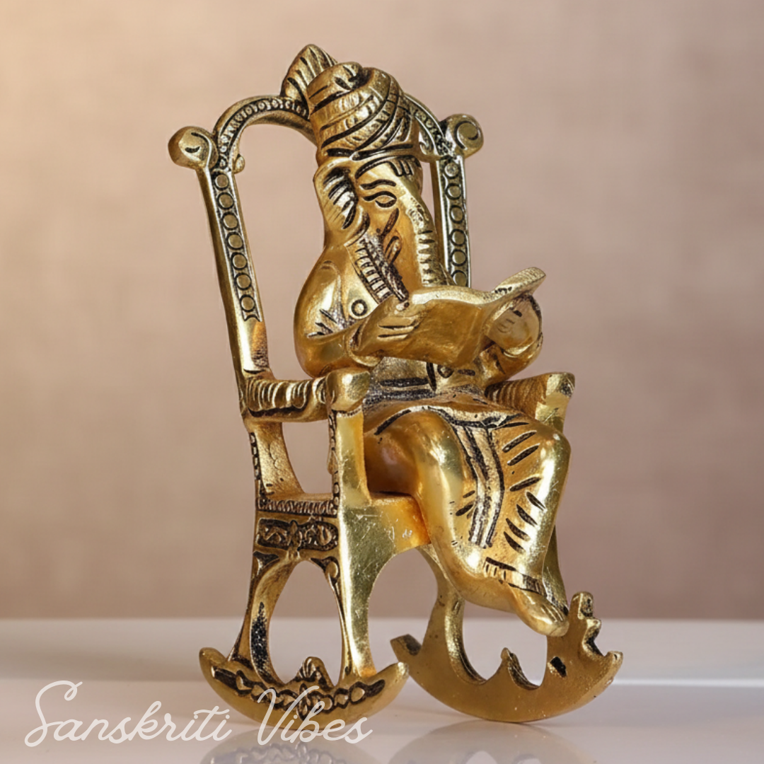 Metal Ganesha Sitting on Moving Chair Reading Ramayan – Handcrafted Ganpati Decorative Statue for Home & Office (Glossy Finish, Made in India)