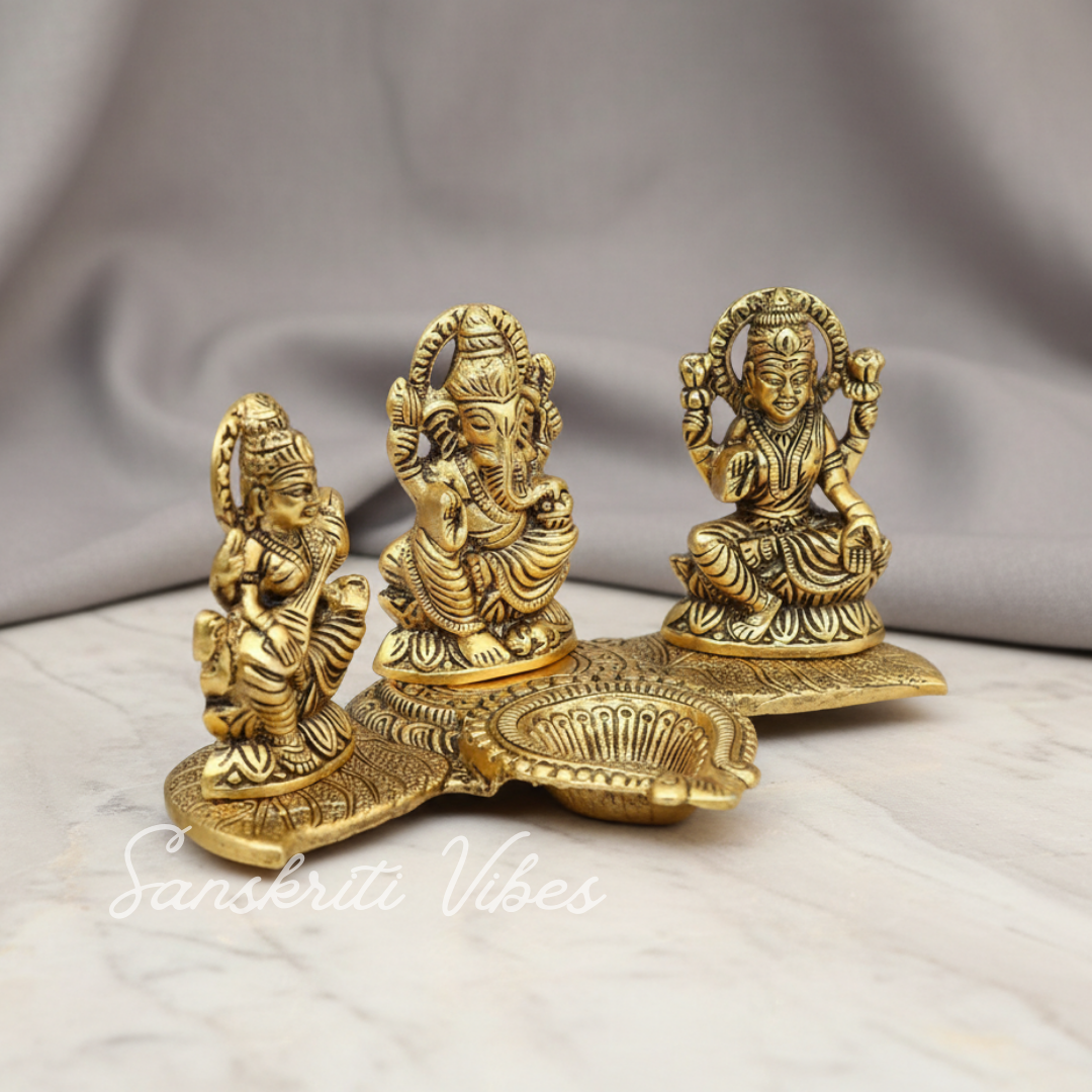 Metal Laxmi Ganesh Saraswati Idol Decorative Murti Showpiece Oil Lamp Diya Gold Plated Decorative Showpiece – 12 Cm (Aluminium) - Retail Maharaj