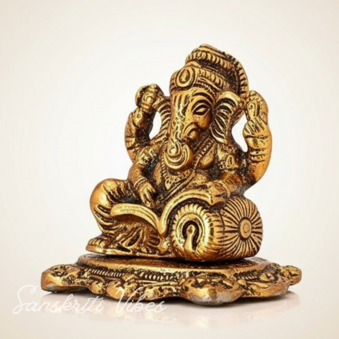 Metal Ganesh Ji Idol with Reading Book Gold Plated for Home and Office Decoration - Retail Maharaj
