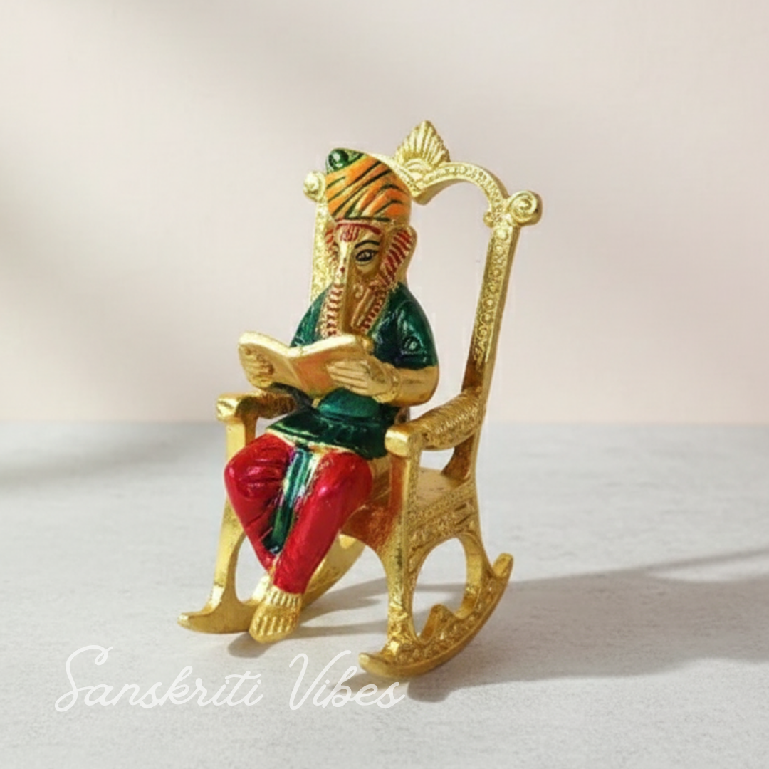 Modern Chair Ganesha Metal Statue Reading Ramayan with Meenakari Work Aluminium Ganesh Showpiece for Home Decor and Auspicious Gifting - Retail Maharaj