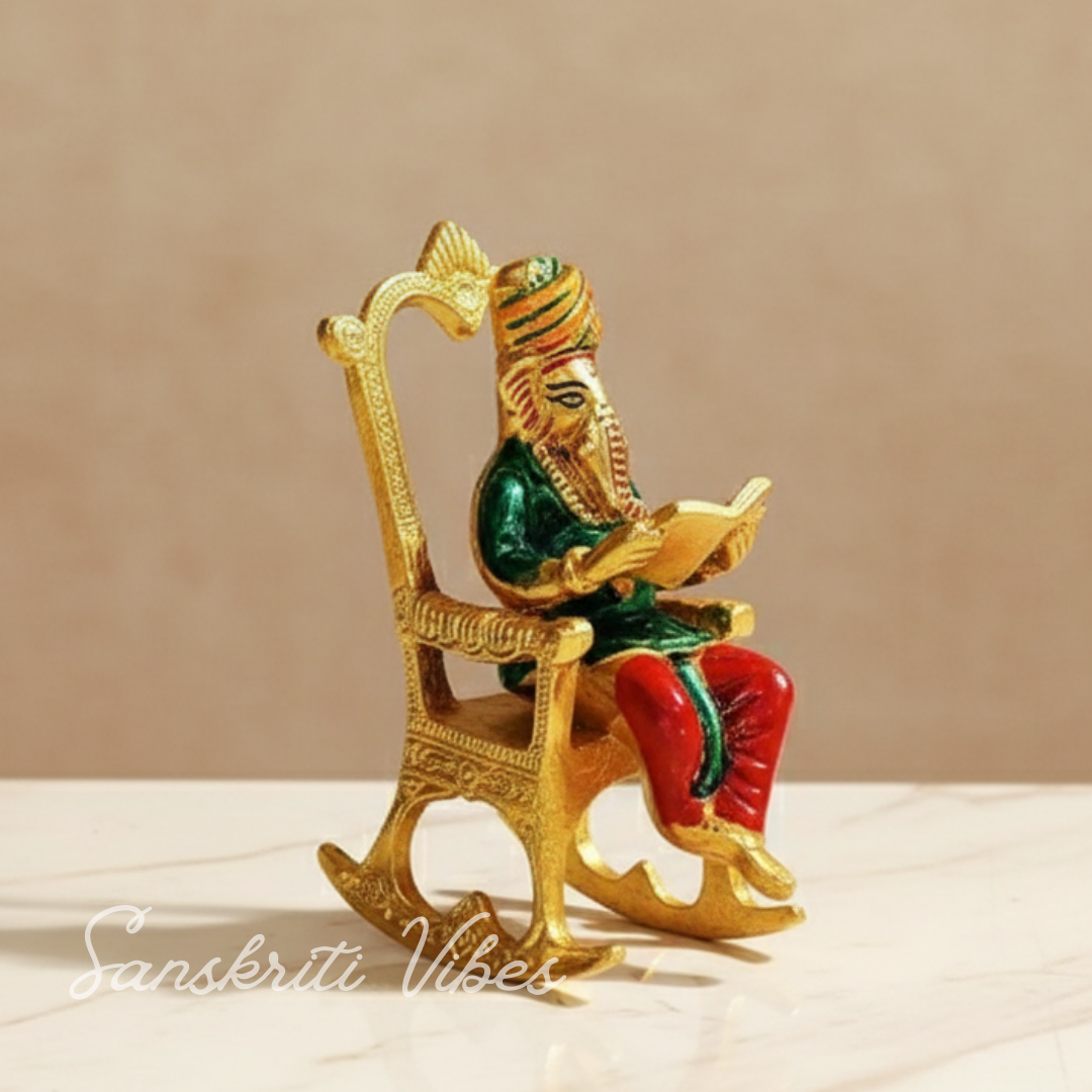 Modern Chair Ganesha Metal Statue Reading Ramayan with Meenakari Work Aluminium Ganesh Showpiece for Home Decor and Auspicious Gifting - Retail Maharaj