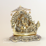 Metal Ganesh Statue Sitting on Boat Aluminium Ganesha Decorative Showpiece for Home Decor and Auspicious Gifting - Retail Maharaj
