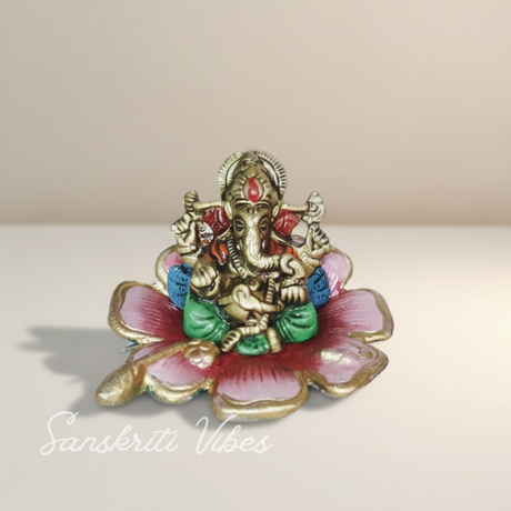 Metal Ganesh on Multi Color Leaf Aluminium Decorative Showpiece for Home Decor and Gift Purpose - Retail Maharaj