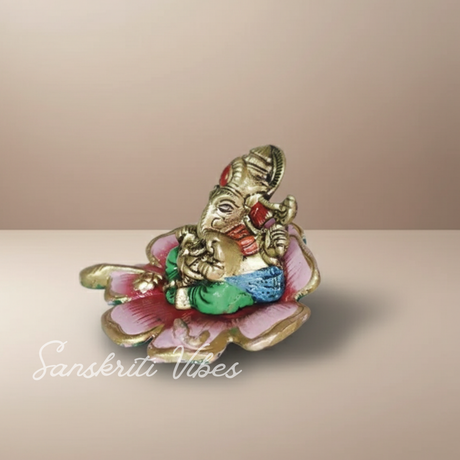 Metal Ganesh on Multi Color Leaf Aluminium Decorative Showpiece for Home Decor and Gift Purpose - Retail Maharaj