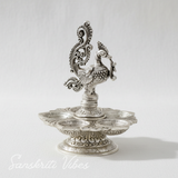 Traditional Silver-Plated Peacock Pooja Thali with 5-Compartment Diya Stand Ornate Design - Retail Maharaj