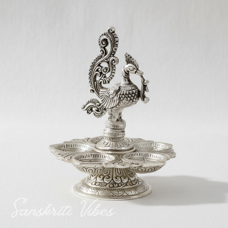 Traditional Silver-Plated Peacock Pooja Thali with 5-Compartment Diya Stand Ornate Design - Retail Maharaj