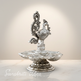 Traditional Silver-Plated Peacock Pooja Thali with 5-Compartment Diya Stand Ornate Design - Retail Maharaj