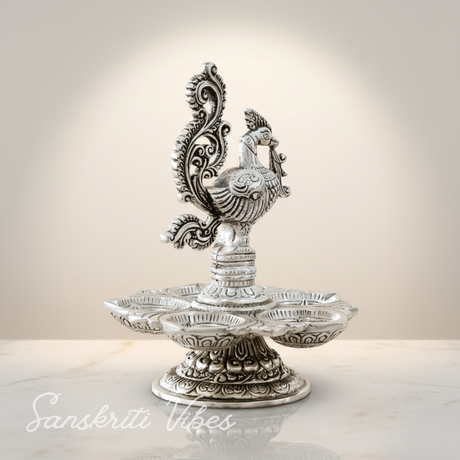 Traditional Silver-Plated Peacock Pooja Thali with 5-Compartment Diya Stand Ornate Design - Retail Maharaj