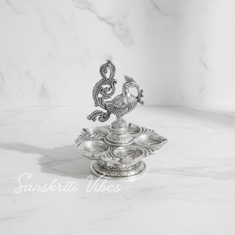 Traditional Silver-Plated Peacock Pooja Thali with 5-Compartment Diya Stand Ornate Design - Retail Maharaj