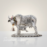 Metal Om Kamdhenu Cow and Calf Statue Decorative Showpiece for Good Luck, Vastu and Feng Shui - Retail Maharaj