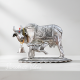 Metal Om Kamdhenu Cow and Calf Statue Decorative Showpiece for Good Luck, Vastu and Feng Shui - Retail Maharaj
