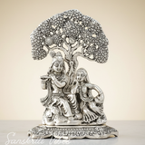 Metal Radha Krishna Idol Under Tree | Silver Decorative Showpiece Statue for Puja Room, Home & Office Desk – 18 cm Spiritual Gift - Retail Maharaj