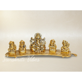 White Metal Gold Plated Ganesha On Leaf With Musical Instrument Metal Statue For Pooja Home Decor And Gift Purpose - Retail Maharaj