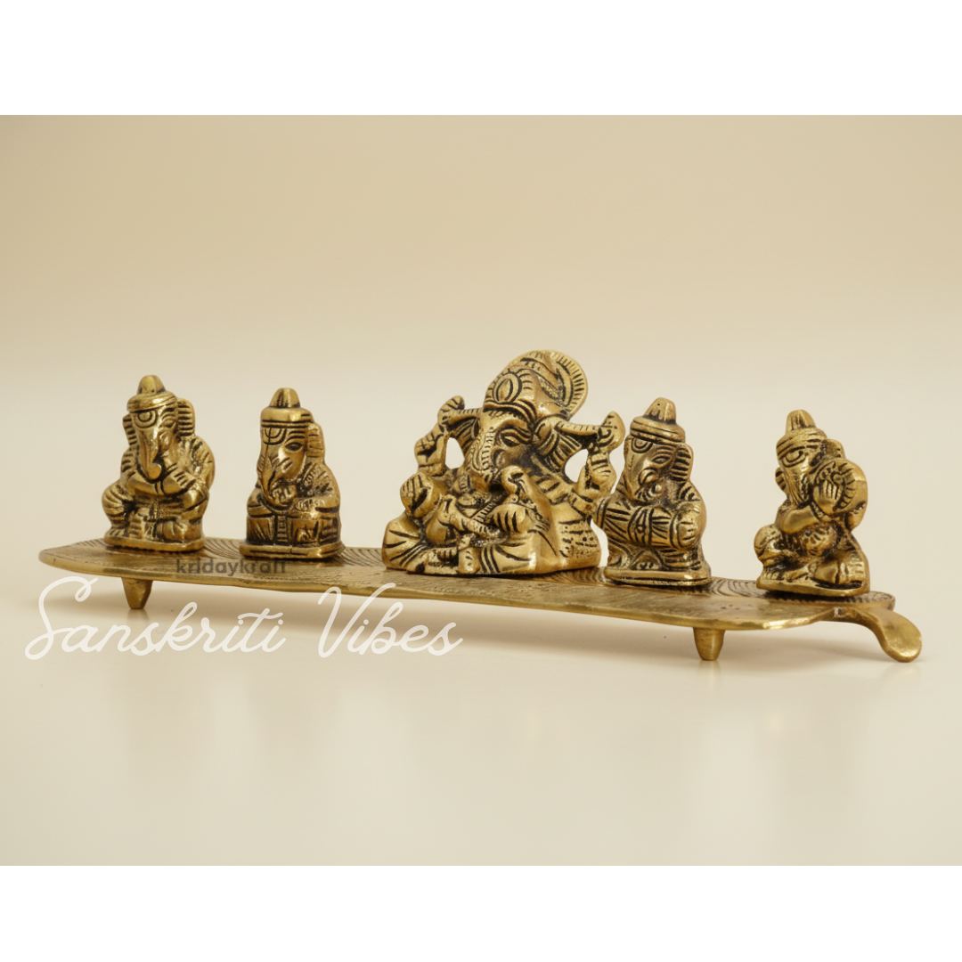 White Metal Gold Plated Ganesha On Leaf With Musical Instrument Metal Statue For Pooja Home Decor And Gift Purpose - Retail Maharaj