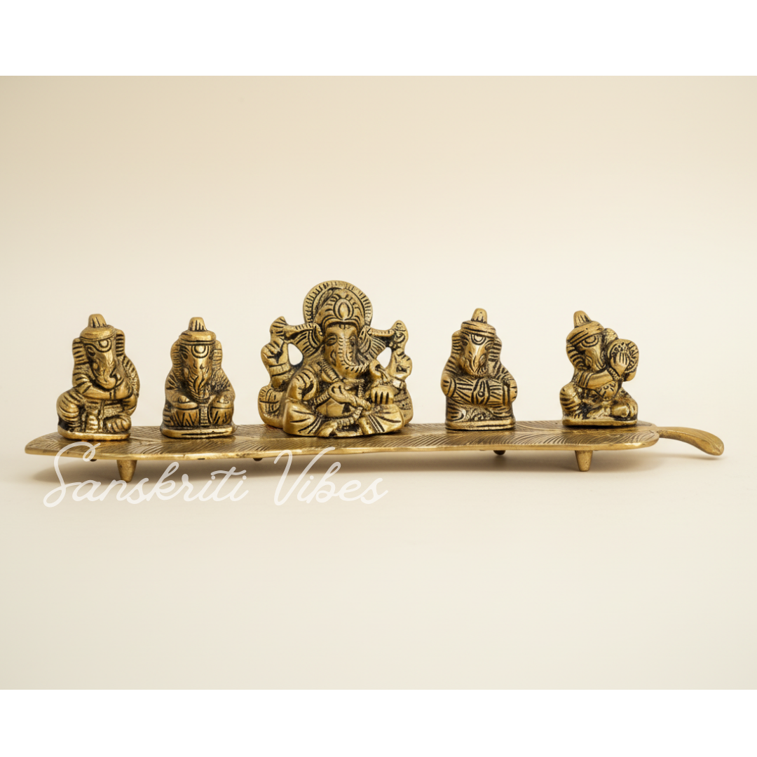 White Metal Gold Plated Ganesha On Leaf With Musical Instrument Metal Statue For Pooja Home Decor And Gift Purpose - Retail Maharaj