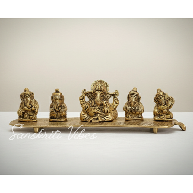 White Metal Gold Plated Ganesha On Leaf With Musical Instrument Metal Statue For Pooja Home Decor And Gift Purpose - Retail Maharaj