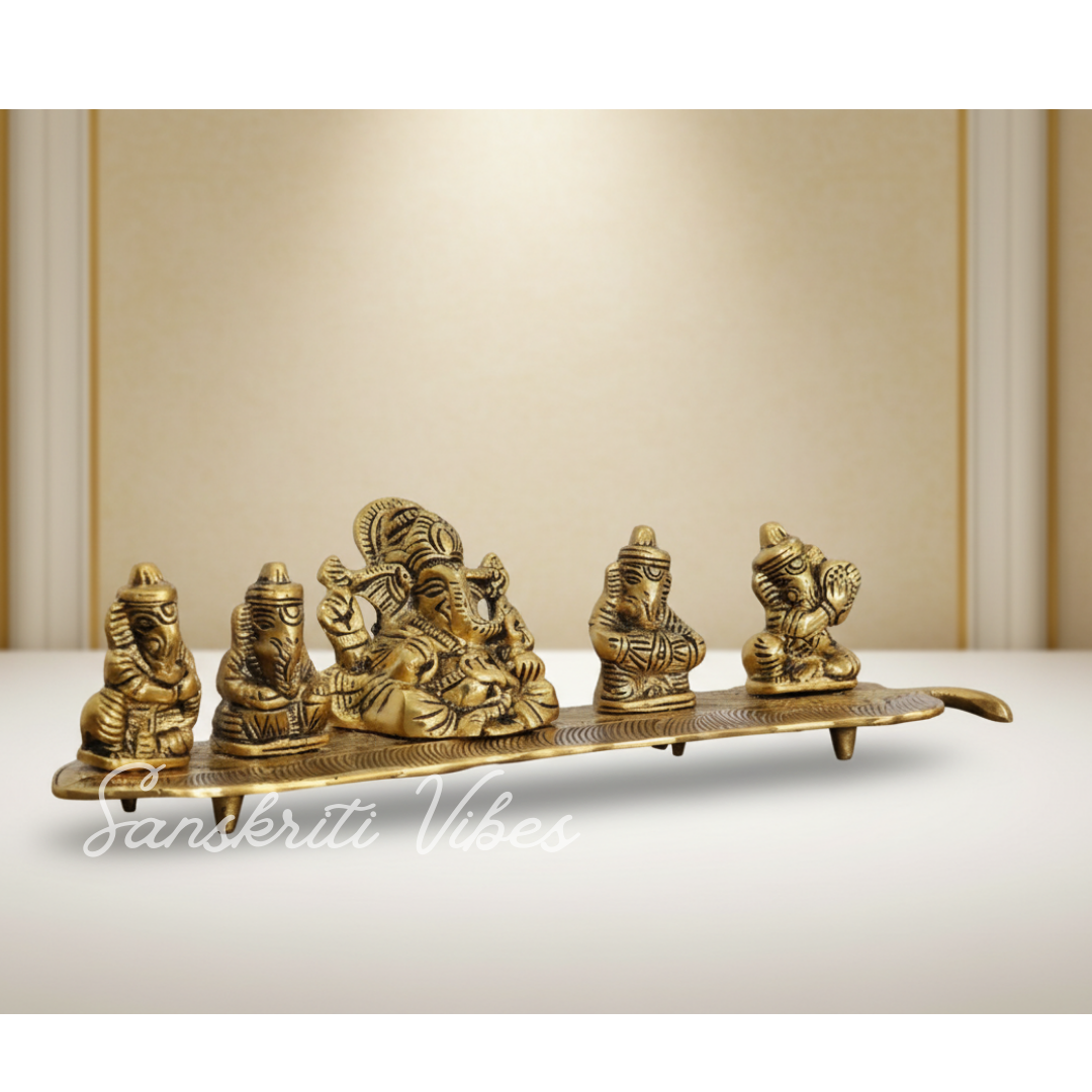 White Metal Gold Plated Ganesha On Leaf With Musical Instrument Metal Statue For Pooja Home Decor And Gift Purpose - Retail Maharaj
