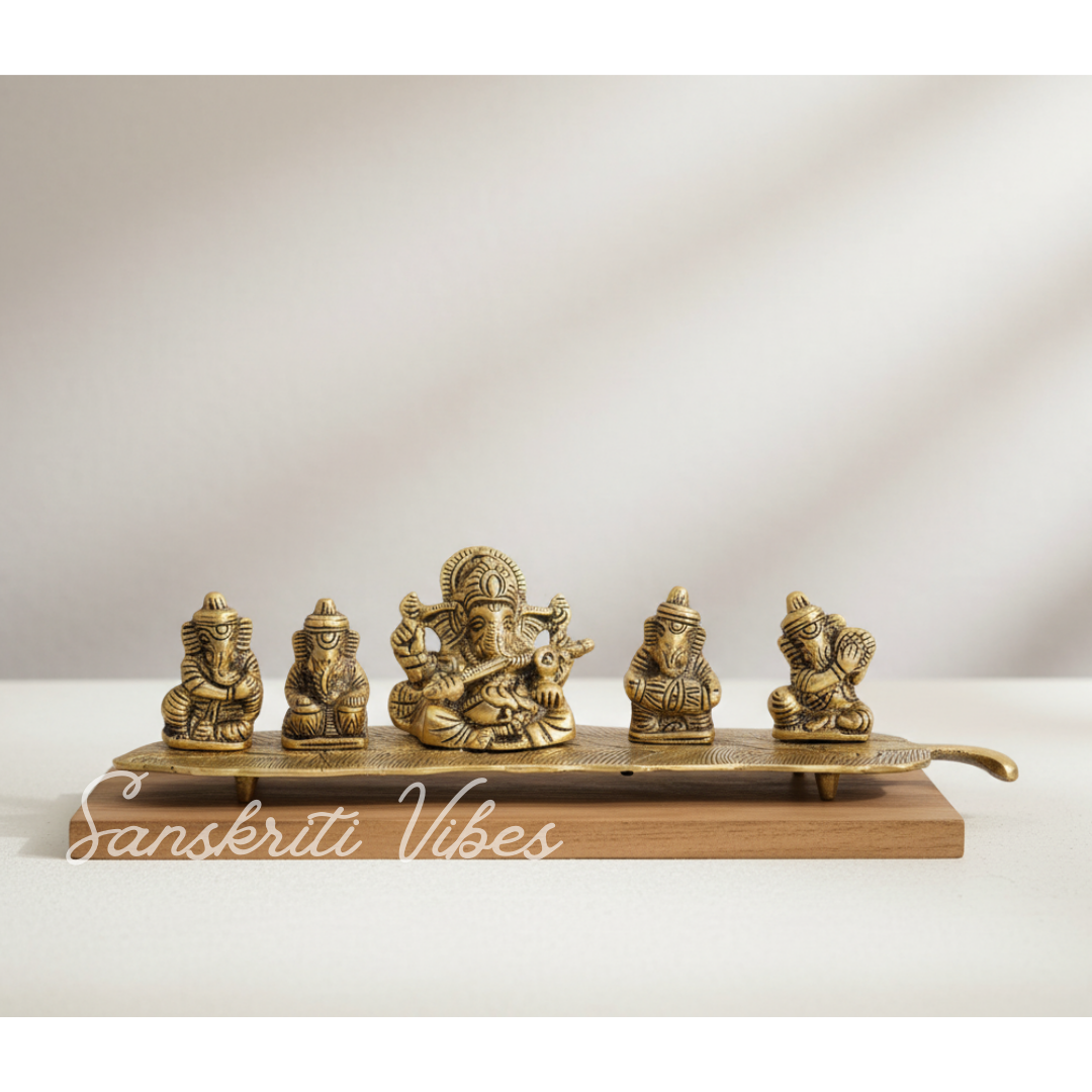 White Metal Gold Plated Ganesha On Leaf With Musical Instrument Metal Statue For Pooja Home Decor And Gift Purpose - Retail Maharaj
