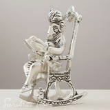 Metal Chair Ganesh Ganpati Idol with Reading Ramayan Metallic Gold Finish Traditional Indian Decorative Showpiece - Retail Maharaj