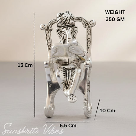 Metal Chair Ganesh Ganpati Idol with Reading Ramayan Metallic Gold Finish Traditional Indian Decorative Showpiece - Retail Maharaj