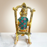 Modern Chair Ganesha Metal Statue Reading Ramayan with Stone Work Showpiece for Home Glossy Finish Ganpati Idol - Retail Maharaj