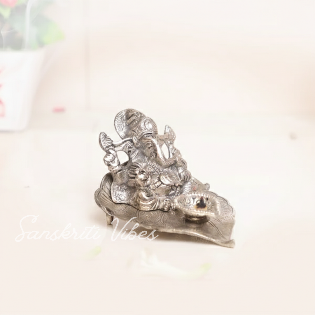Ganesha With Diya Metal Statue - Retail Maharaj
