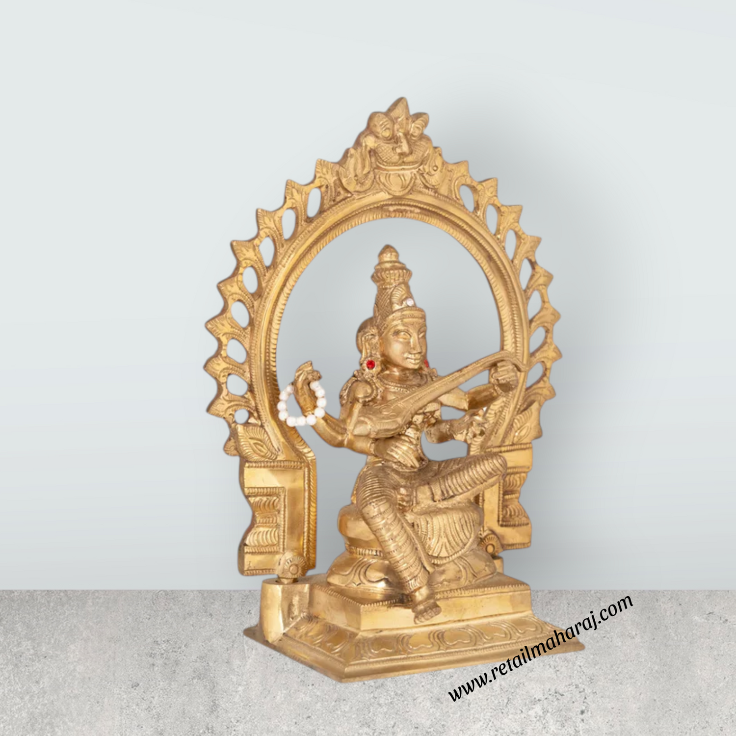 Saraswati Sitting on Base with Arch Murti - 9.5 x 7.5 inches | Panchaloha Idol / Vagdevi Statue for pooja - Retail Maharaj
