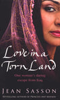 Love In A Torn Land: One Woman's Daring Escape from Saddam's Poison Gas Attacks on the Kurdish People of Iraq - Retail Maharaj
