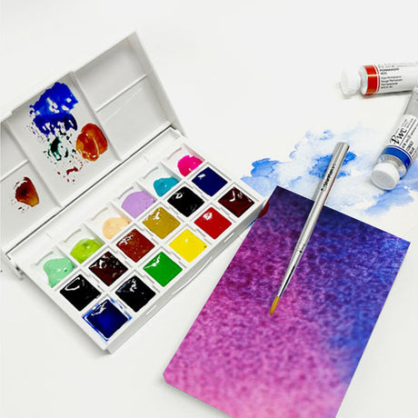 ShinHan PWC, Extra Fine Water Color Half Pan Set – 12 Colors + 6 Wells (FREE Travel Brush Included) - Retail Maharaj