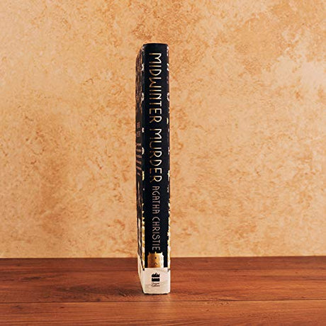 MIDWINTER MURDER: Fireside Mysteries from the Queen of Crime - Retail Maharaj