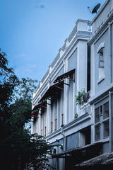Echoes of Colonial Calm – Pastel Serenity in Architectural Elegance - Retail Maharaj
